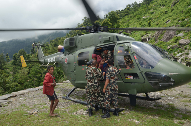 https://archive.nepalitimes.com/assets/uploads/gallery/d085a-NA-rescue.jpg