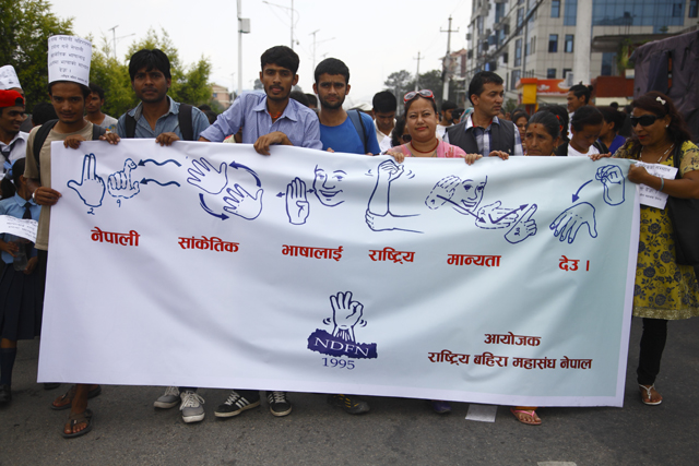 https://archive.nepalitimes.com/assets/uploads/gallery/e2827-Sign-language-nepal.jpg