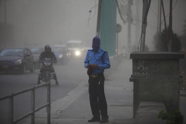 https://archive.nepalitimes.com/assets/uploads/gallery/e88c5-Traffic-police-during-dust-storm.JPG