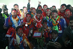 https://archive.nepalitimes.com/image.php?&width=250&image=/assets/uploads/gallery/07d1e-Nepal-SAG-gold.jpg