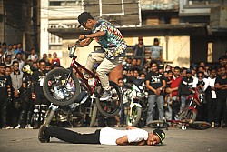 https://archive.nepalitimes.com/image.php?&width=250&image=/assets/uploads/gallery/2c516-Bike-stunt.jpg