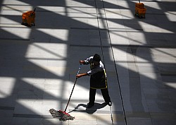 https://archive.nepalitimes.com/image.php?&width=250&image=/assets/uploads/gallery/77482-Janitor-at-LABIM-MALL.jpg